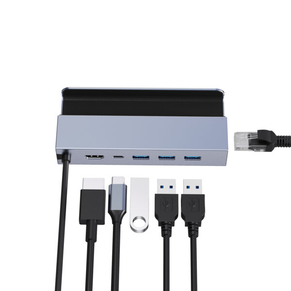 A top-down view of the SD1 Docking Station with various connected peripherals, including USB drives, an HDMI cable, a USB Type-C cable, and an Ethernet cable, demonstrating its versatility and ease of use.