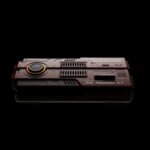 Direct top-down view of the AYANEO AG01 against a black background, clearly showing the engraved branding and heat vents.